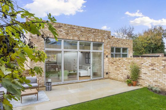 A patio and glass doors of a house