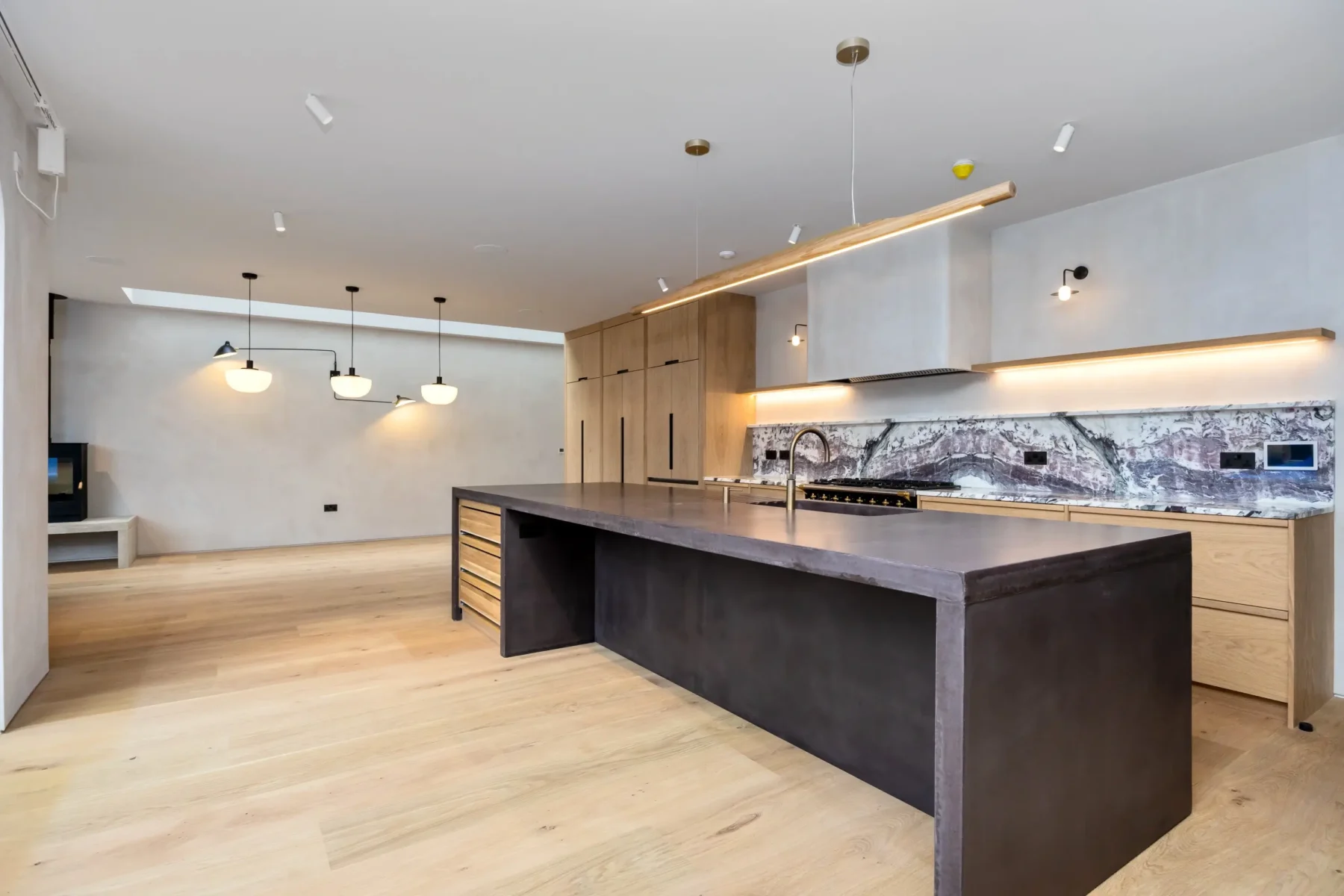 A kitchen with wooden flooring