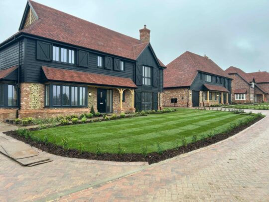 Two large houses and driveway